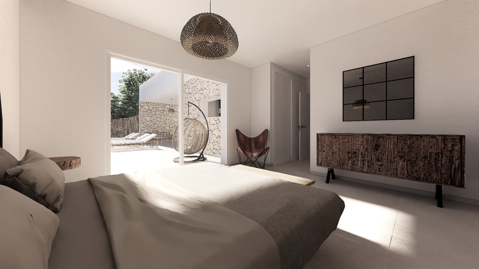 Chambre avec accès direct à la terrasse, buffet en bois rustique, fauteuil papillon et vue sur la piscine bordée de murs en pierre.