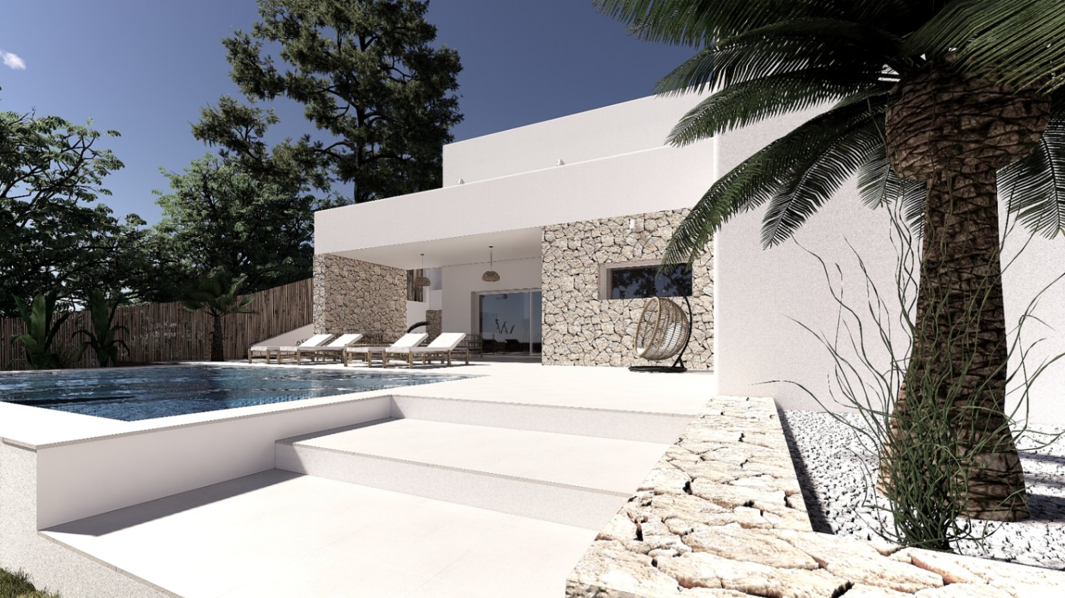 Vue extérieure avec piscine, façade blanche et murs en pierre naturelle. Terrasse aménagée avec chaises longues et fauteuil suspendu.