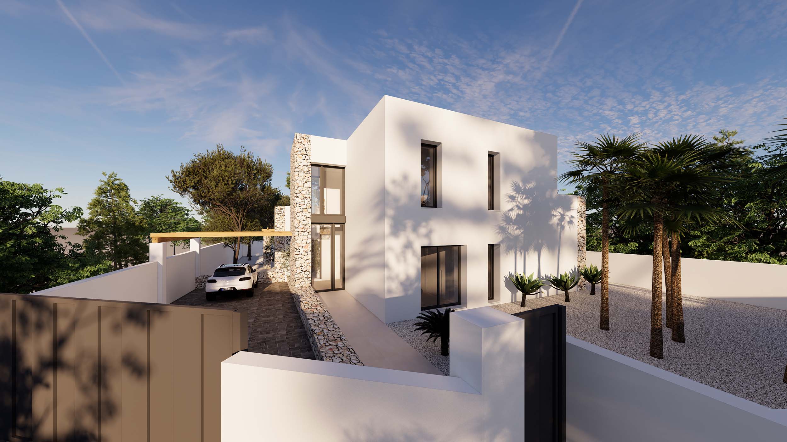 Façade de style Ibiza avec murs en pierre naturelle, architecture cubique blanche et jardin méditerranéen. L'entrée dispose d'une allée pavée et d'un parking sous pergola.