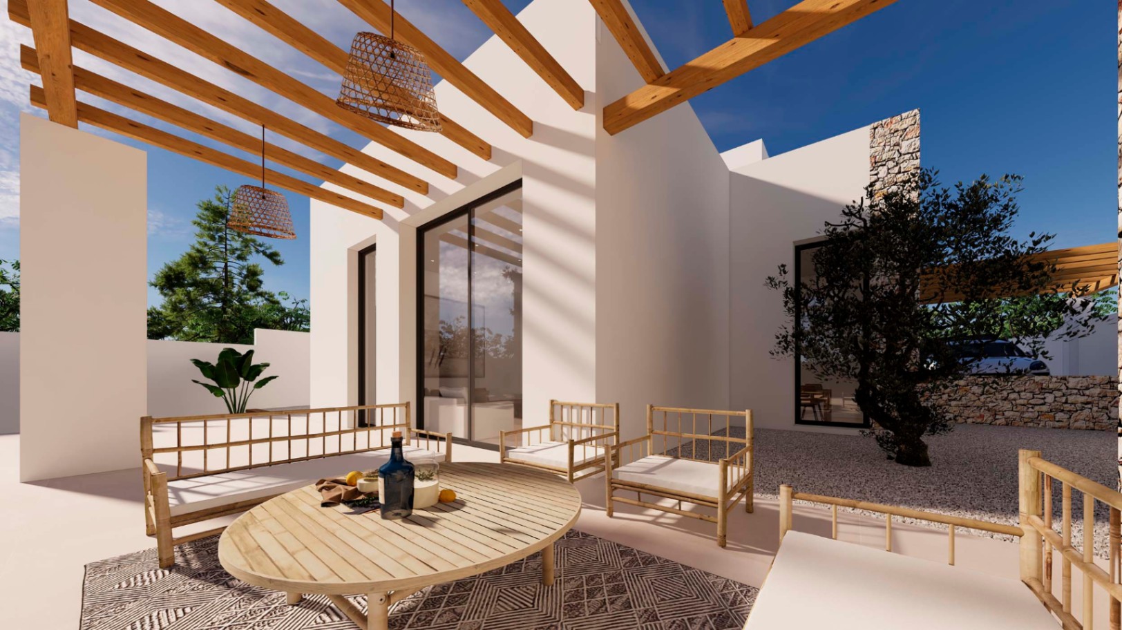 Terrasse de style ibizien avec pergola en bois, mobilier en bambou et suspensions en osier. L'espace extérieur comprend un olivier et des murs en pierre naturelle.