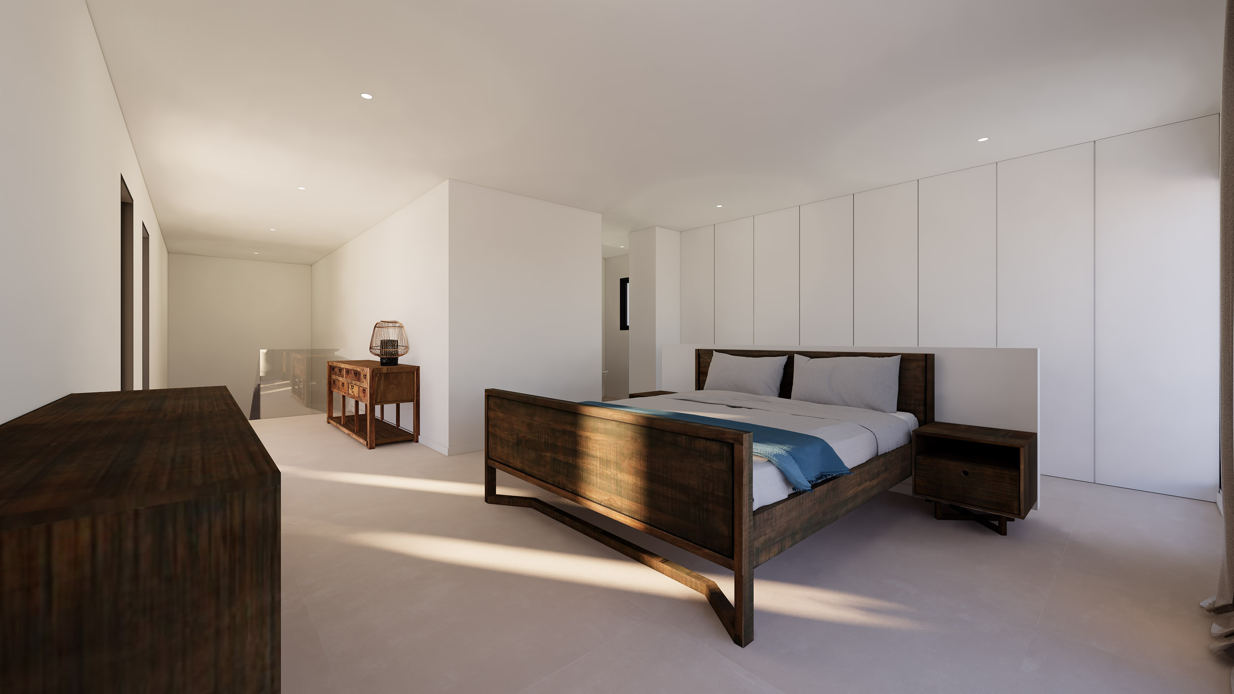 Chambre avec lit en bois sombre, placards intégrés blancs et vue sur l'escalier à paroi de verre, le tout éclairé par des spots encastrés.