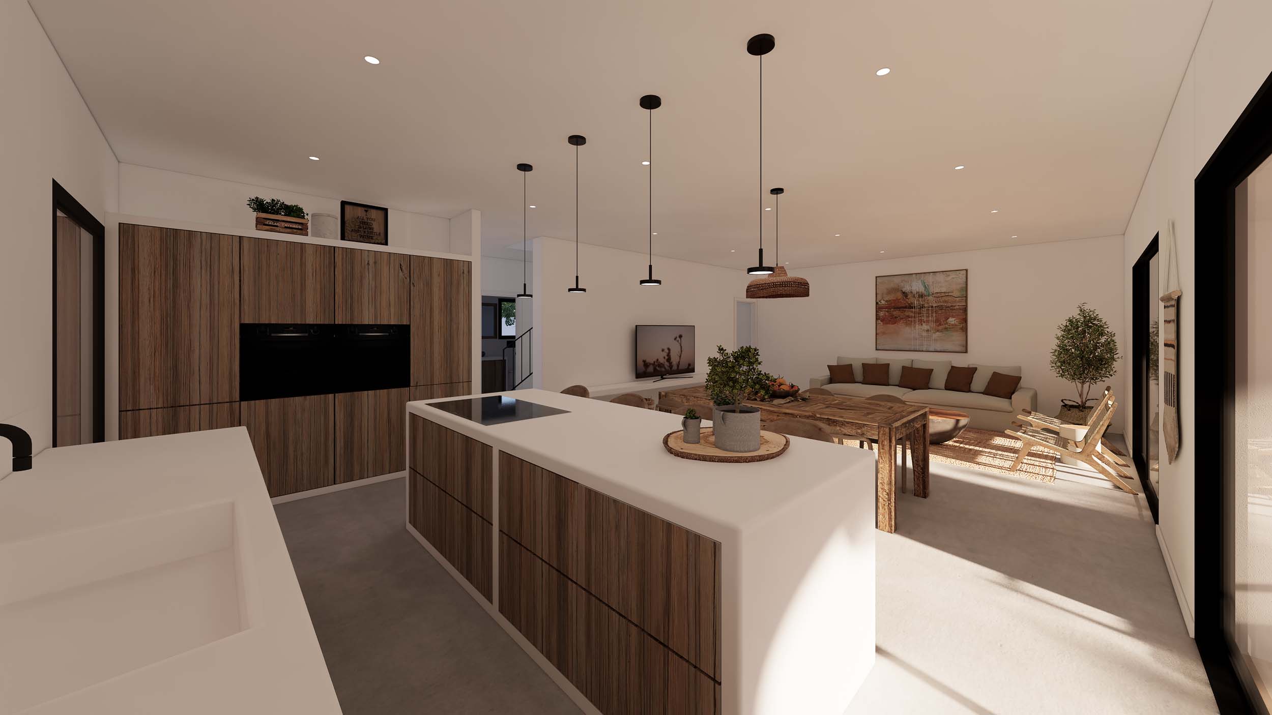 Cuisine à aire ouverte avec îlot blanc et finitions en bois, s'ouvrant sur un salon spacieux doté d'un mobilier rustique et de grandes baies vitrées.