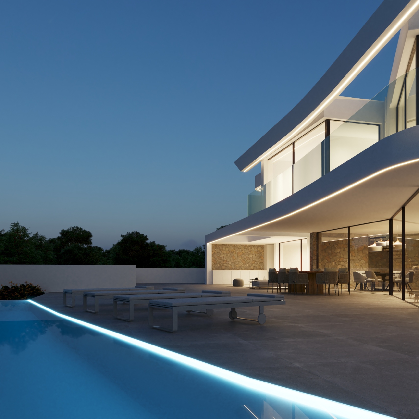 Terrasse extérieure avec piscine à débordement éclairée par LED, espace dînatoire abrité et façade contemporaine alliant pierre naturelle et larges baies vitrées.
