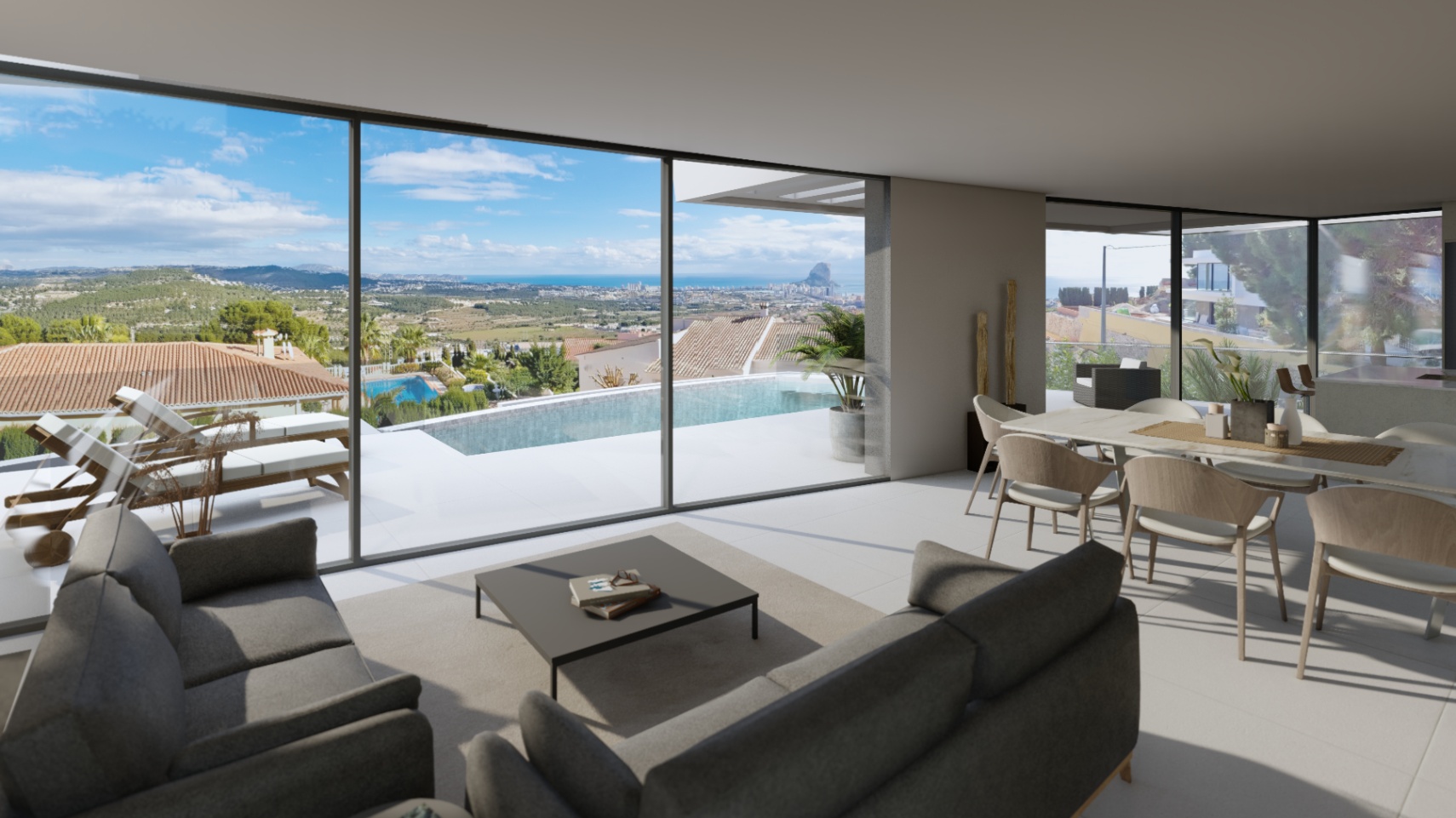 Salon et salle à manger à aire ouverte avec de grandes baies vitrées offrant une vue panoramique sur la mer, le Peñón de Ifach et la piscine à débordement.