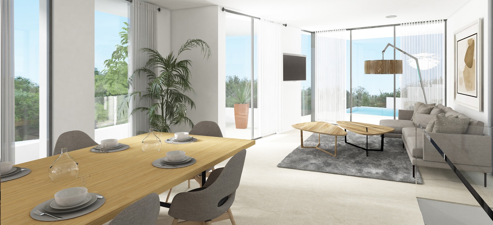 Espace de vie lumineux avec coin repas en bois, salon contemporain et grandes baies vitrées s'ouvrant sur la terrasse et la piscine à débordement.