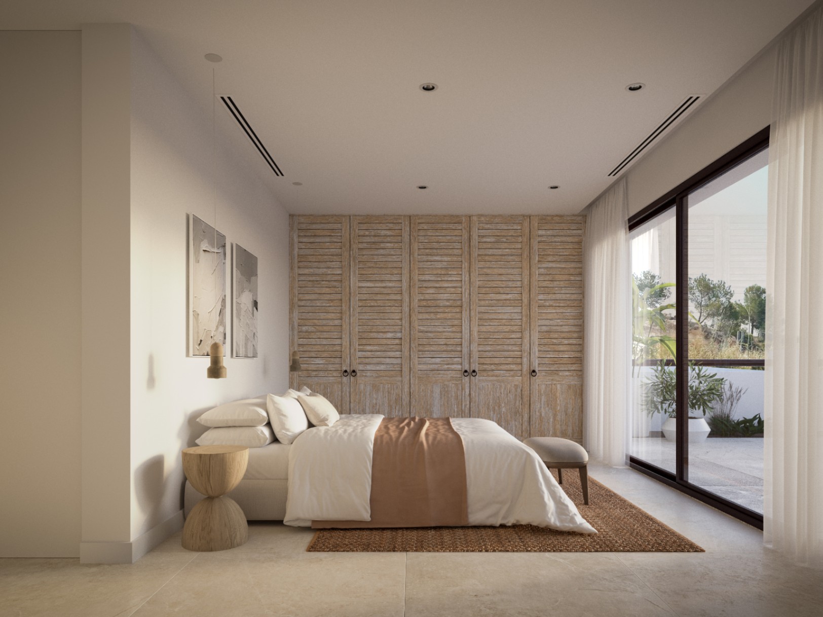 Chambre principale avec placards intégrés en bois vieilli, sol en pierre naturelle et grandes baies vitrées coulissantes ouvrant sur la terrasse.