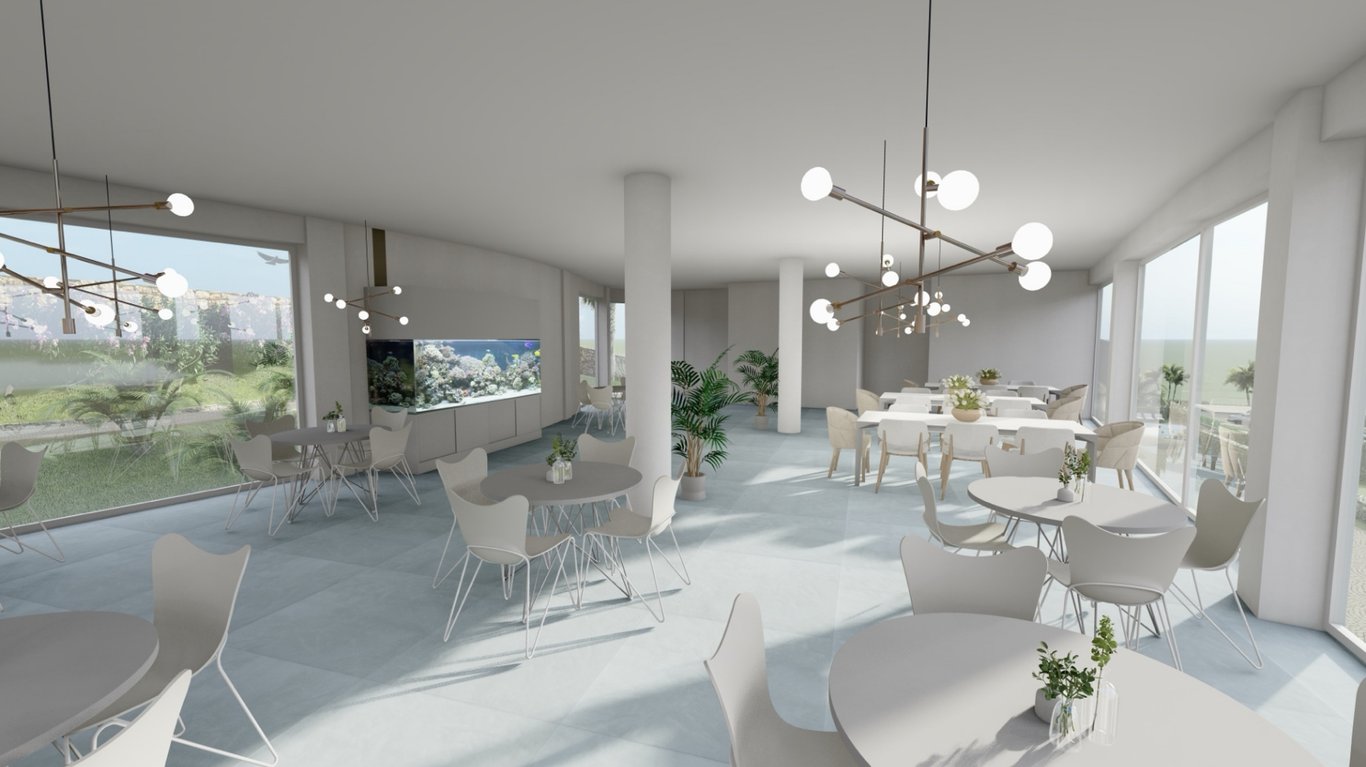 Espace de restauration minimaliste avec baies vitrées, lustres modernes, un grand aquarium intégré et une vue dégagée sur le jardin méditerranéen.