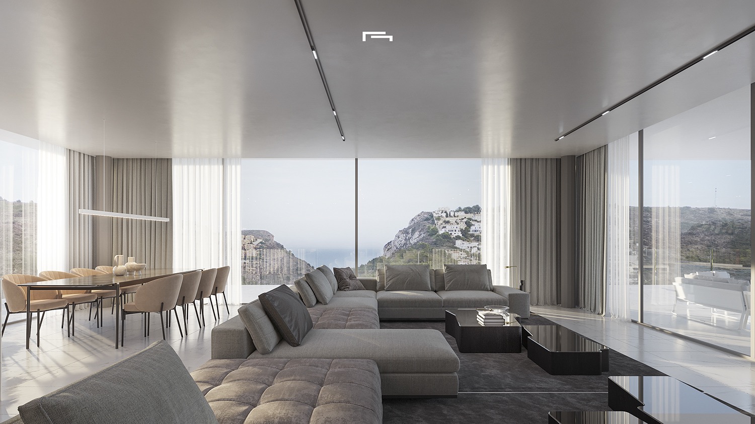 Salon et salle à manger à aire ouverte avec baies vitrées panoramiques sur la mer, canapé modulaire gris et éclairage minimaliste encastré au plafond.