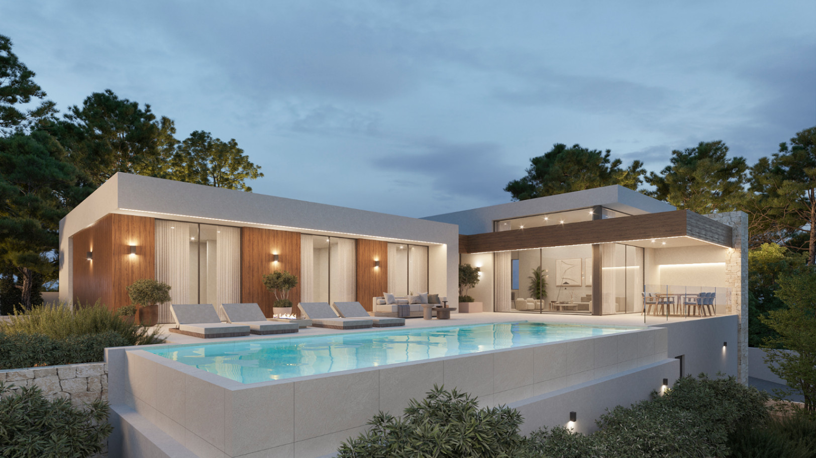 Vue extérieure nocturne de la villa avec piscine à débordement, façades en bois et grandes baies vitrées. La terrasse dispose d'un éclairage intégré et d'un espace lounge.