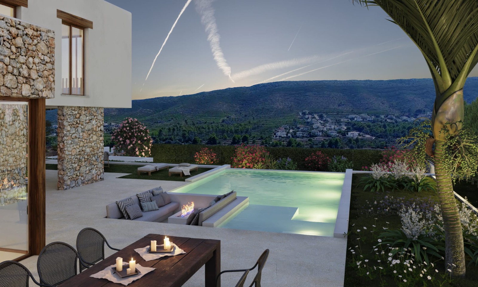 Terrasse extérieure avec piscine à débordement intégrant un salon encastré et un brasero. Murs en pierre naturelle et vue panoramique sur la vallée de Jávea au crépuscule.