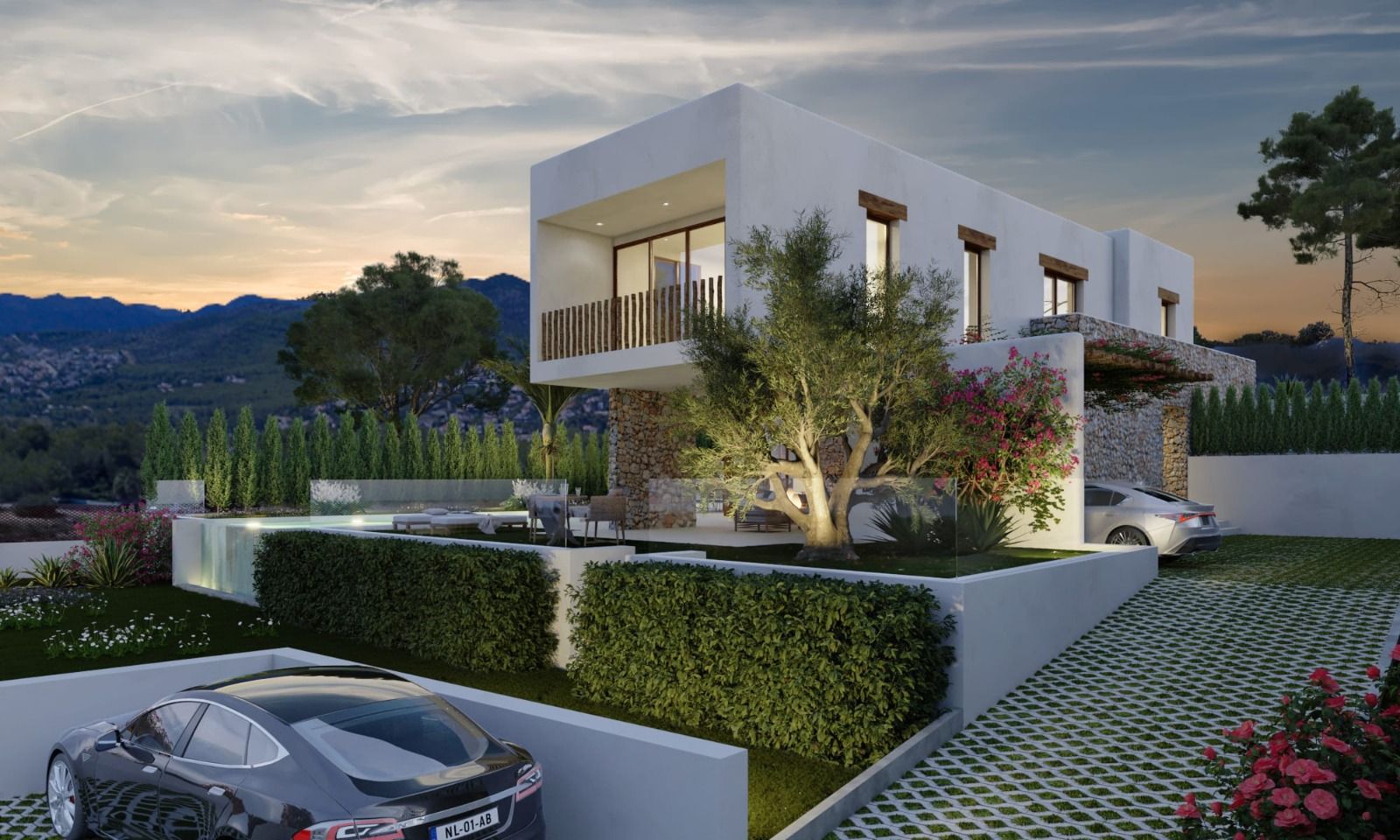 Vue extérieure de la villa de style ibizien avec murs en pierre naturelle, façade blanche et jardin paysager comprenant un olivier éclairé et une piscine.