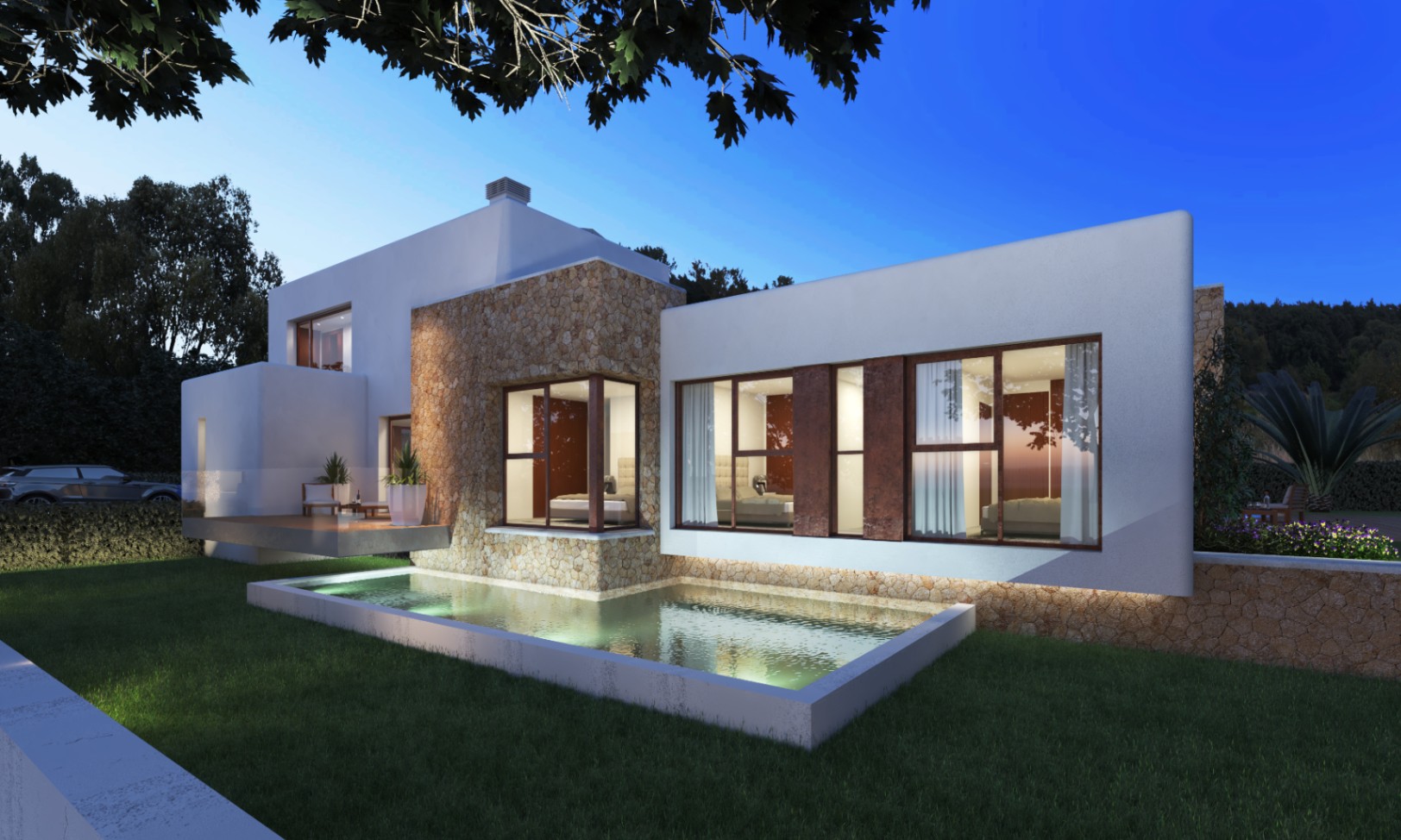 Vue extérieure de la villa avec piscine illuminée et façade en pierre naturelle.