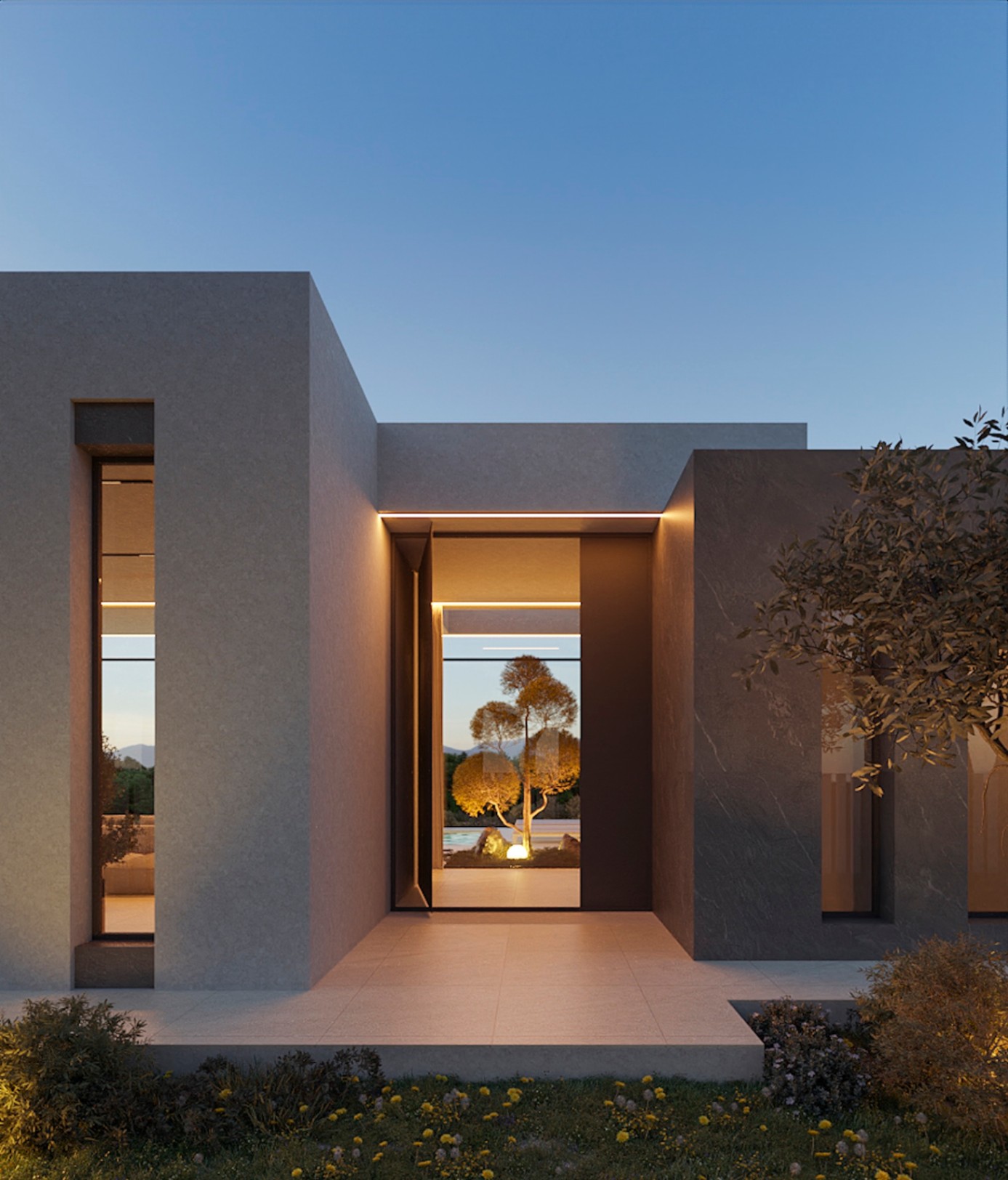 Façade principale minimaliste avec entrée design, éclairage LED intégré et vue traversante sur le jardin et son arbre illuminé.