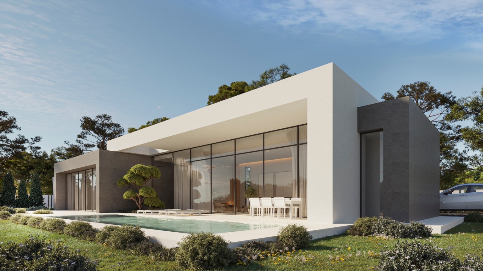 Villa contemporaine de plain-pied avec de grandes baies vitrées, piscine rectangulaire et terrasse avec coin repas extérieur dans un jardin paysager.