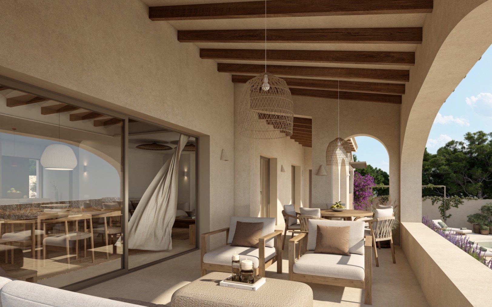 Porche couvert avec poutres en bois apparentes, suspensions en osier et mobilier d'extérieur épuré, offrant une transition fluide vers l'intérieur de la villa.