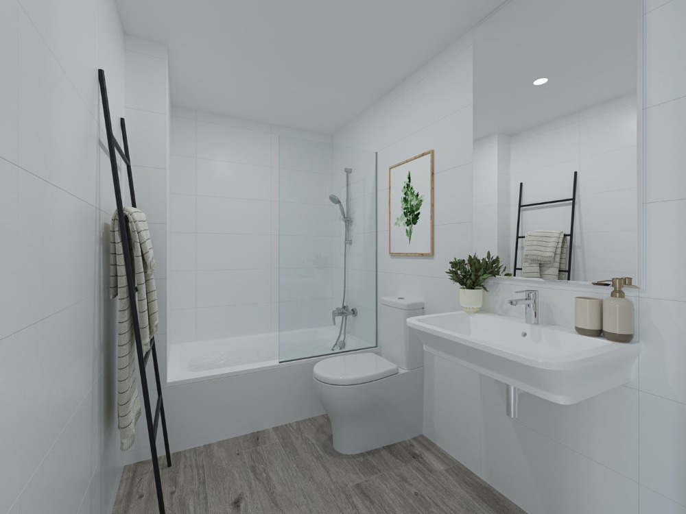 Salle de bain moderne avec carrelage blanc, sol effet bois, baignoire avec paroi en verre et lavabo suspendu au design épuré.