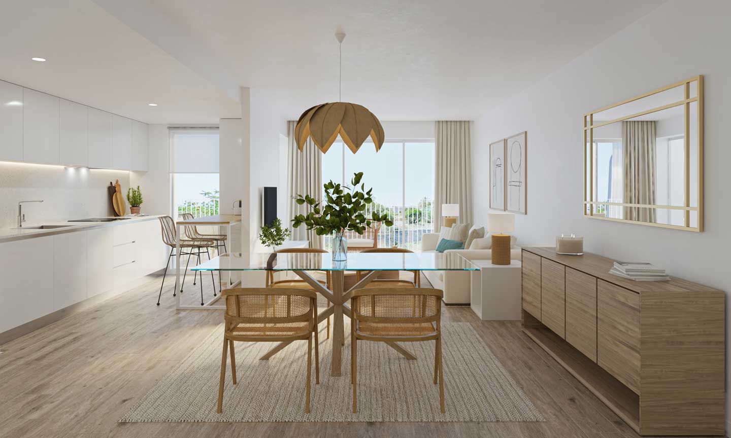 Séjour ouvert avec cuisine blanche minimaliste, table à manger en verre et chaises en rotin, offrant un accès direct à la terrasse par de larges baies vitrées.