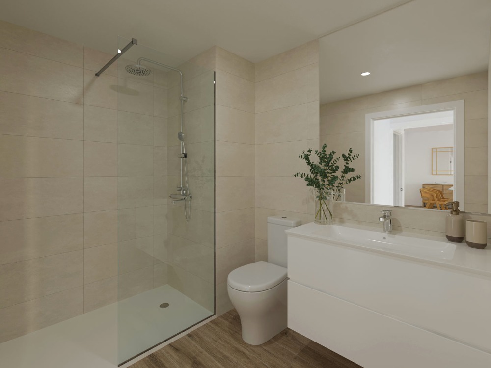 Salle de bain moderne avec douche à l'italienne, paroi en verre, carrelage beige et meuble vasque suspendu blanc.