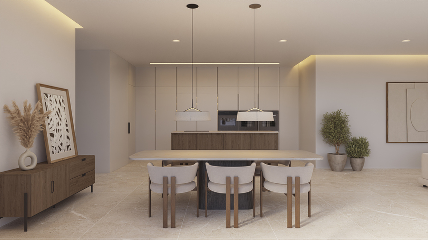 Salle à manger à aire ouverte avec table en pierre, chaises design et cuisine minimaliste intégrée, soulignée par un éclairage indirect chaleureux.