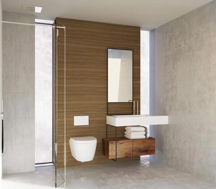 Salle de bain épurée avec mur en bois texturé, vasque suspendue et WC suspendu. Elle dispose d'une paroi de douche vitrée et d'un apport de lumière naturelle latérale.