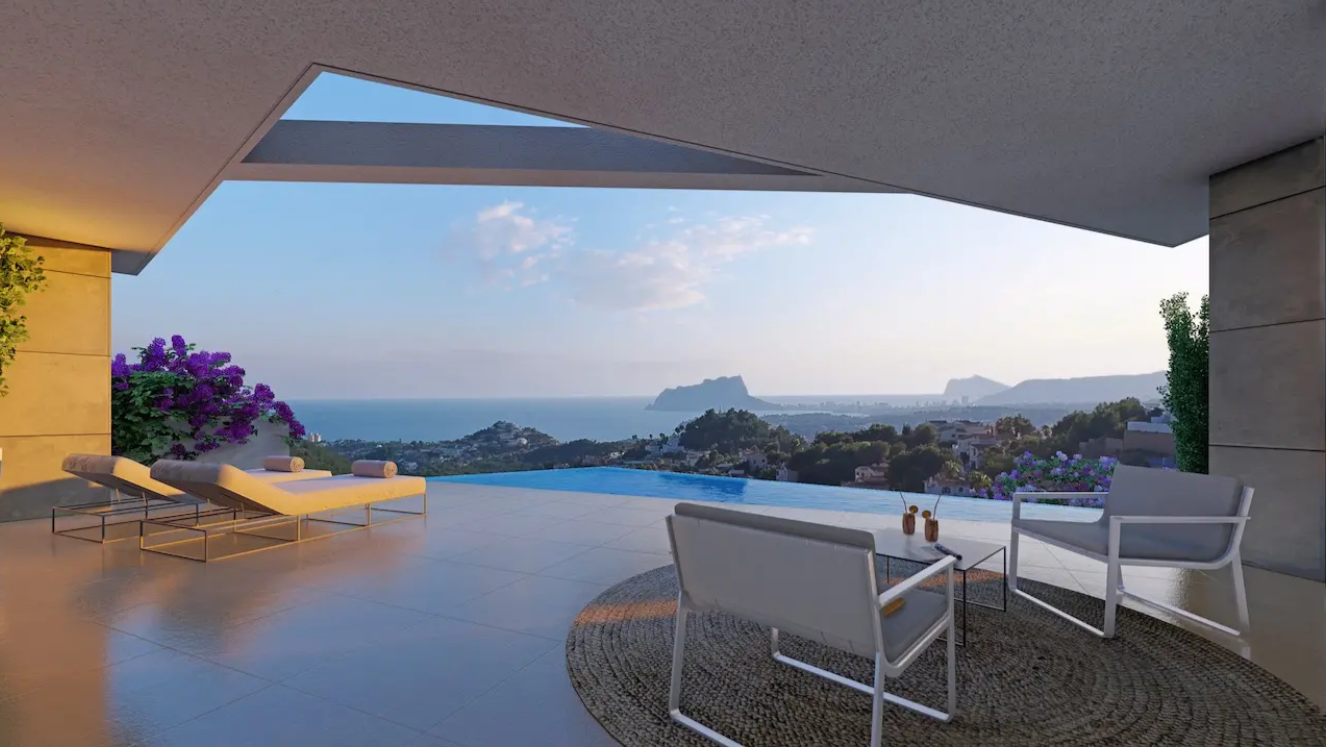 Terrasse avec piscine à débordement et vue panoramique sur la Méditerranée et le Peñón de Ifach. Comprend un salon extérieur moderne sous un plafond architectural.