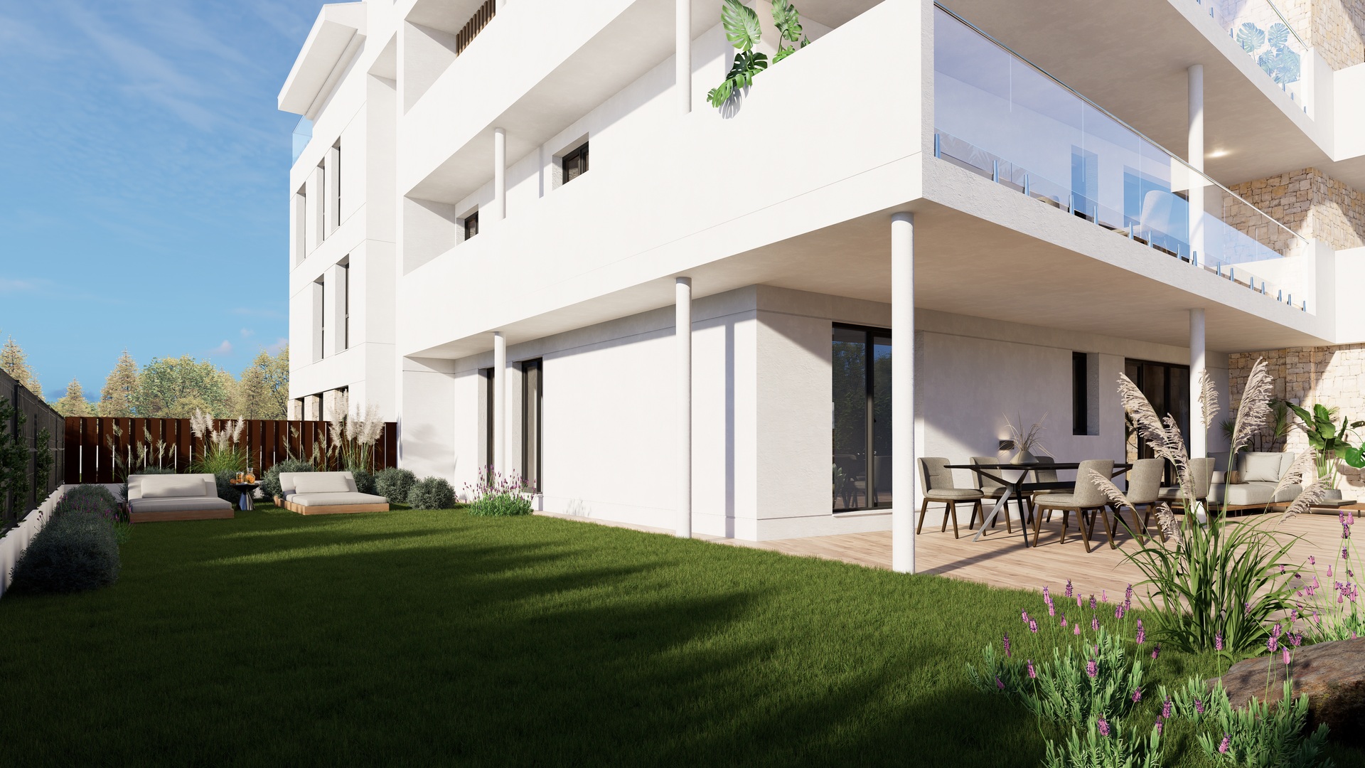 Appartement en rez-de-chaussée avec jardin privé, terrasse couverte aménagée et façade blanche moderne agrémentée de parements en pierre.