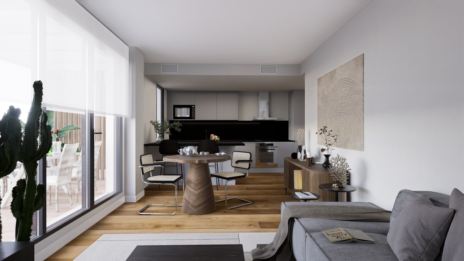 Espace de vie ouvert comprenant une cuisine moderne grise, un coin repas en bois et un parquet en chêne. De larges baies vitrées s'ouvrent sur la terrasse privée.