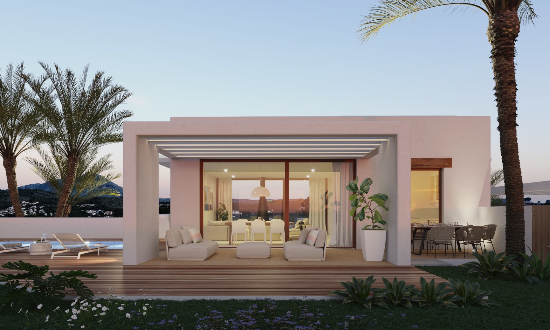 Vue extérieure de la villa avec terrasse en bois, salon couvert sous pergola et grandes baies vitrées donnant sur la piscine et le mont Montgó.