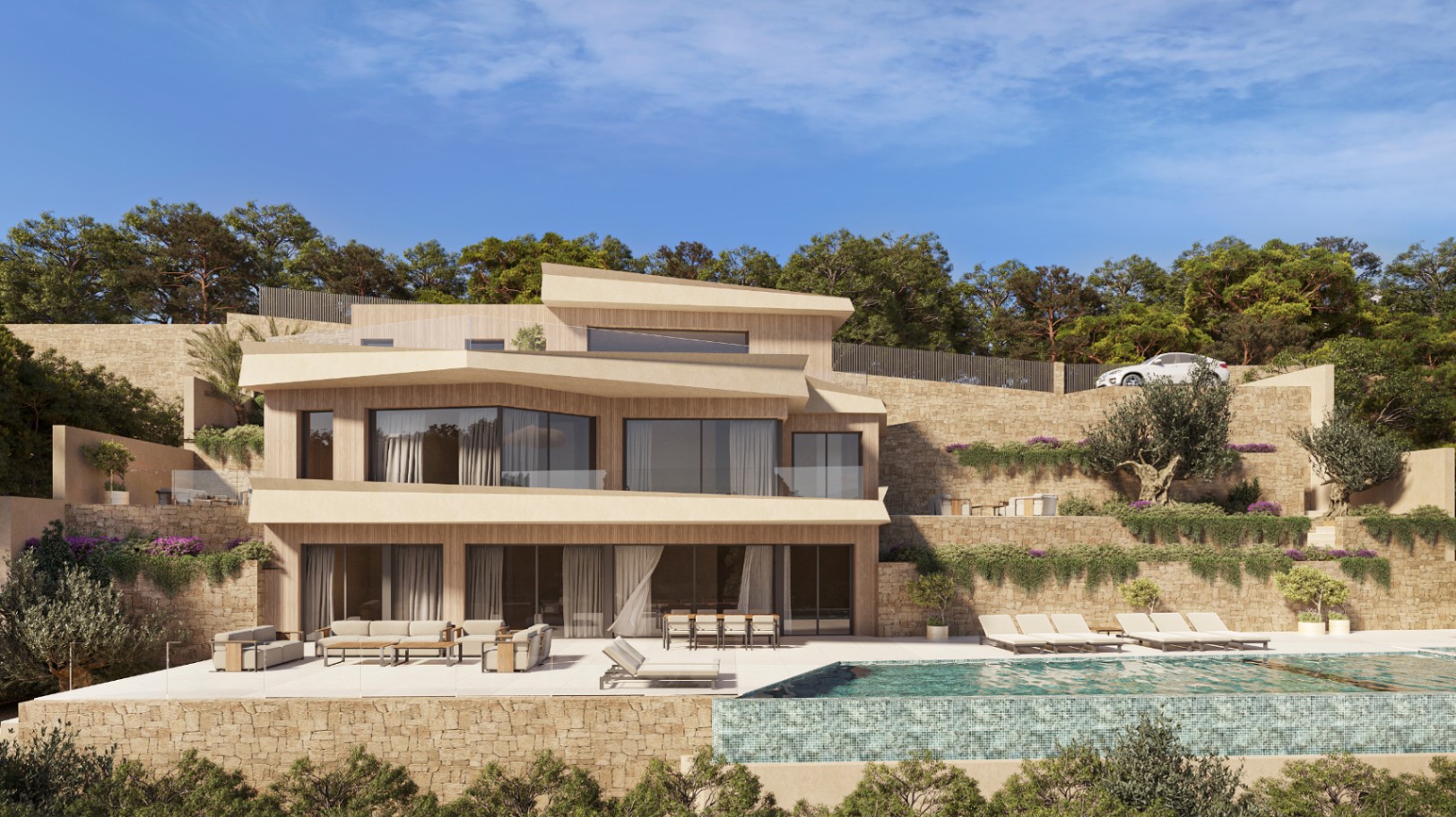 Vue extérieure de la villa moderne avec façade en bois, piscine à débordement, grandes terrasses aménagées et jardins méditerranéens en restanques de pierre.