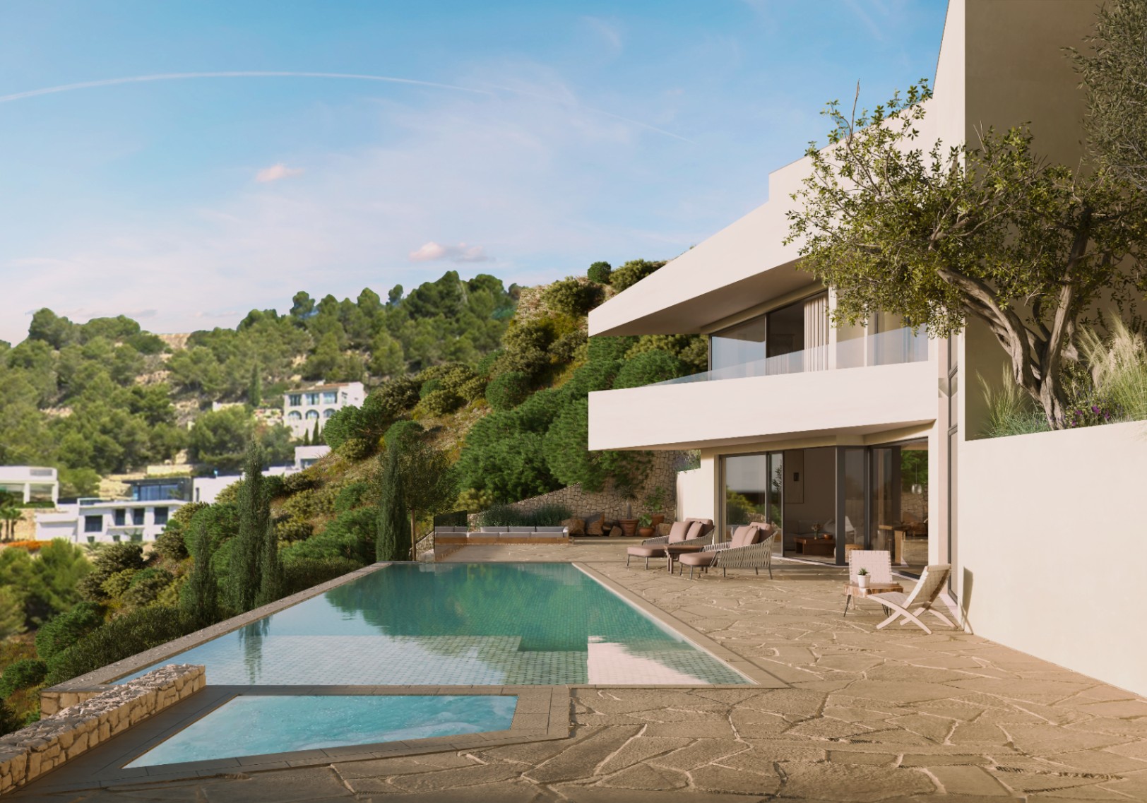 Vue extérieure de la villa avec piscine à débordement et terrasse en pierre naturelle avec mobilier d'extérieur.