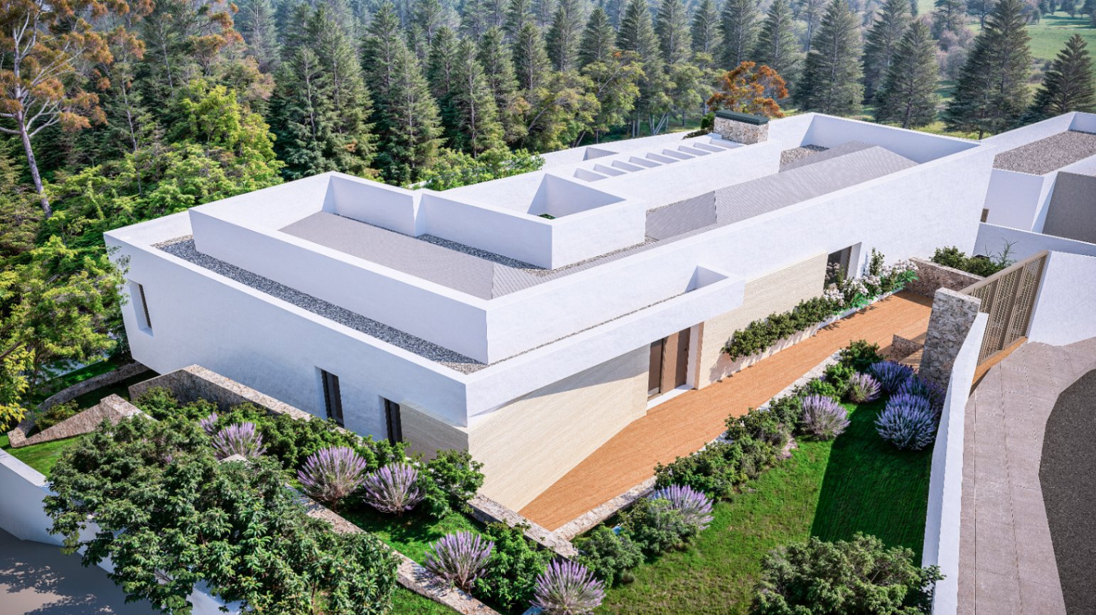 Vue aérienne de l'architecture moderne aux lignes épurées, avec façades blanches, murs en pierre et jardin paysager bordé d'une forêt de pins.